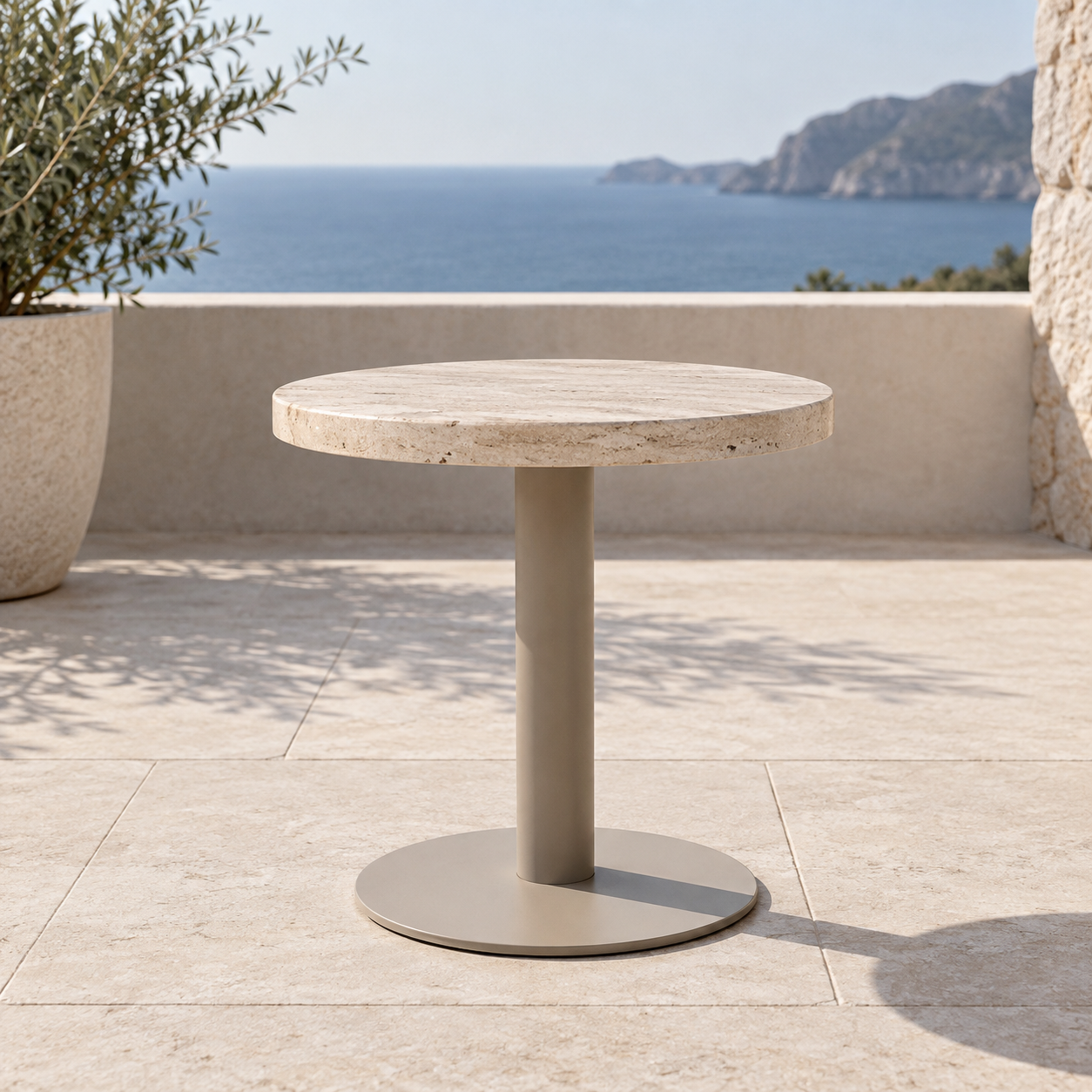 Outdoor pedestal table positioned for a hospitality dining area