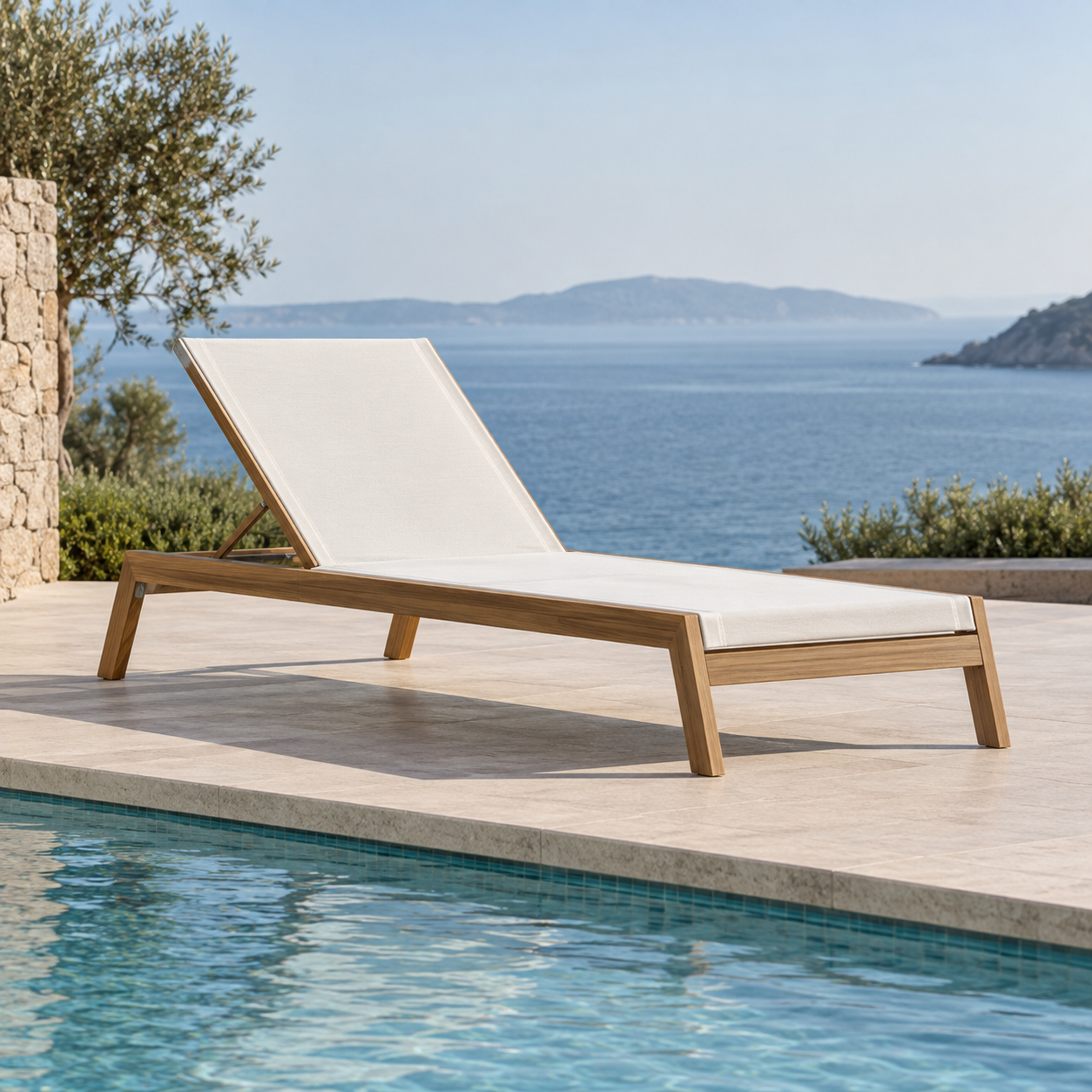 Commercial poolside sun loungers beside a resort pool